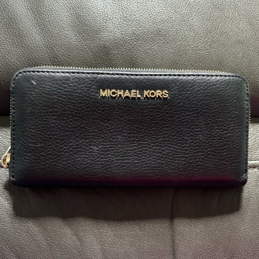 Michael Kors Black - Zip around wallet .